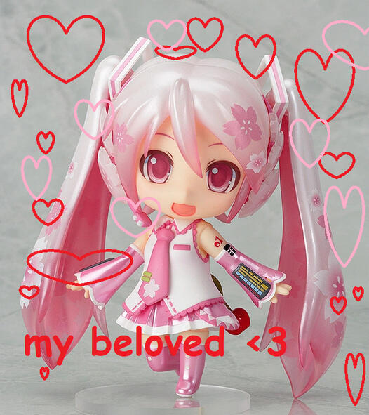 A Sakura Miku Nendoroid #274 with red and pink hearts around her, "my beloved " is